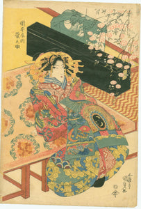 Kunisada: Seated Beauty next to instrument cases