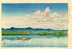 Hasui: Lake Hamana. A boatman and two passengers glide across the softly rippled lake on a hot summer day.