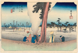 Hiroshige: Farmers warm themselves at this winter scene at Hamamatsu, from the Hôeido Tokaido series. First state.